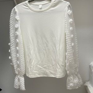 White long sleeve top